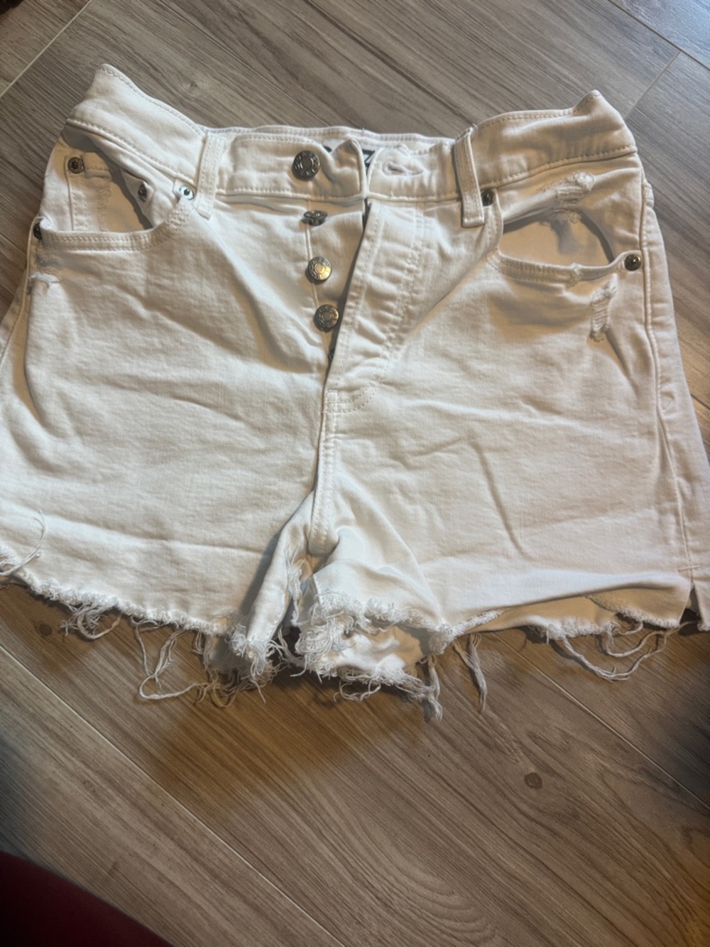High-Rise White Distressed Denim Shorts